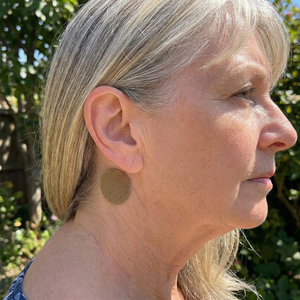 Aurenza Shop EarBliss Tinnitus Relief Patch package showing a month’s supply of patches for ear tinnitus relief.