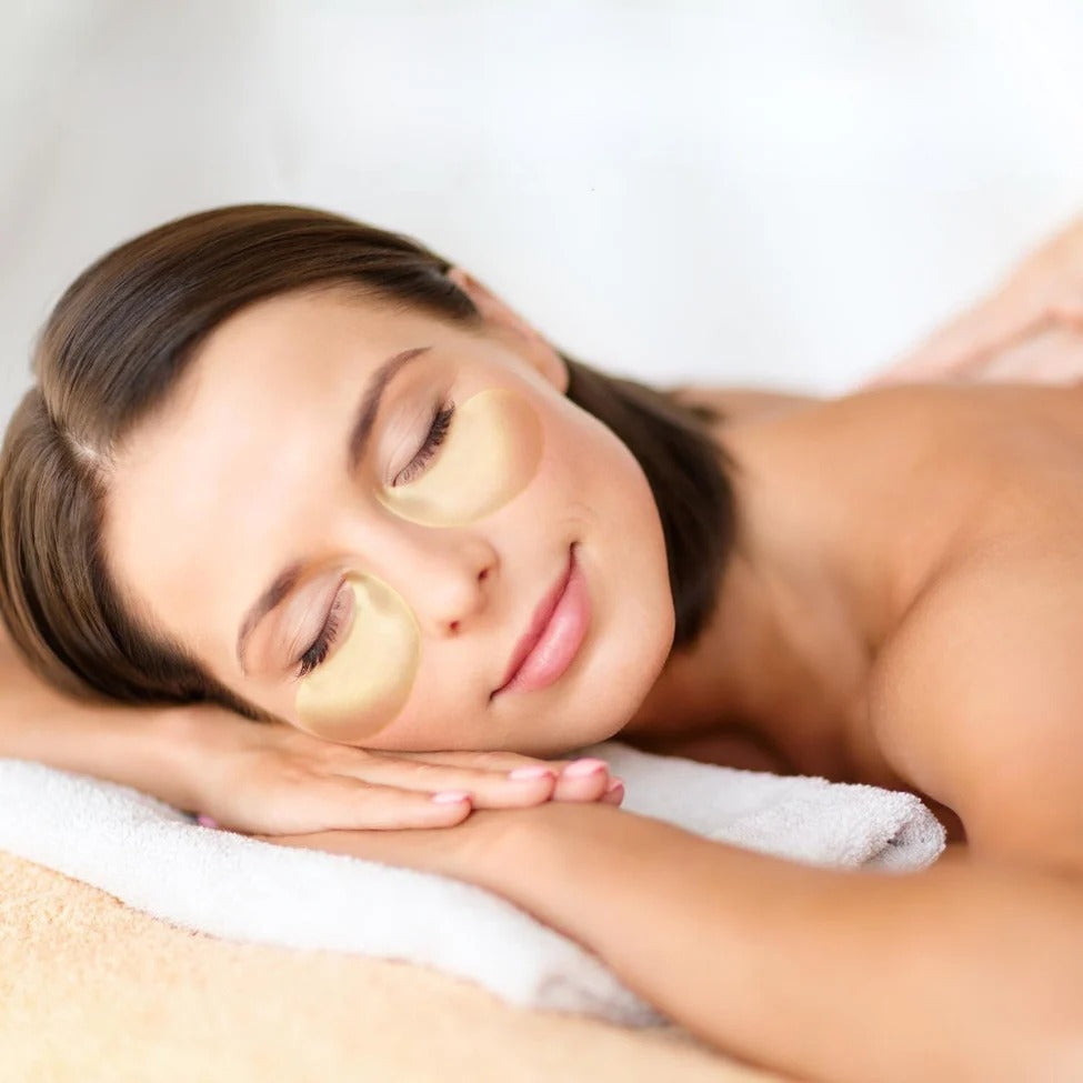 Gold under eye patches by Aurenza Shop, showing a pack of 60 luxurious gold eye patches for skincare.