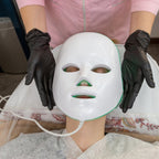 Wireless Aurenza Face Mask Light Therapy Pro device for facial skin treatment with adjustable light settings and sleek design.