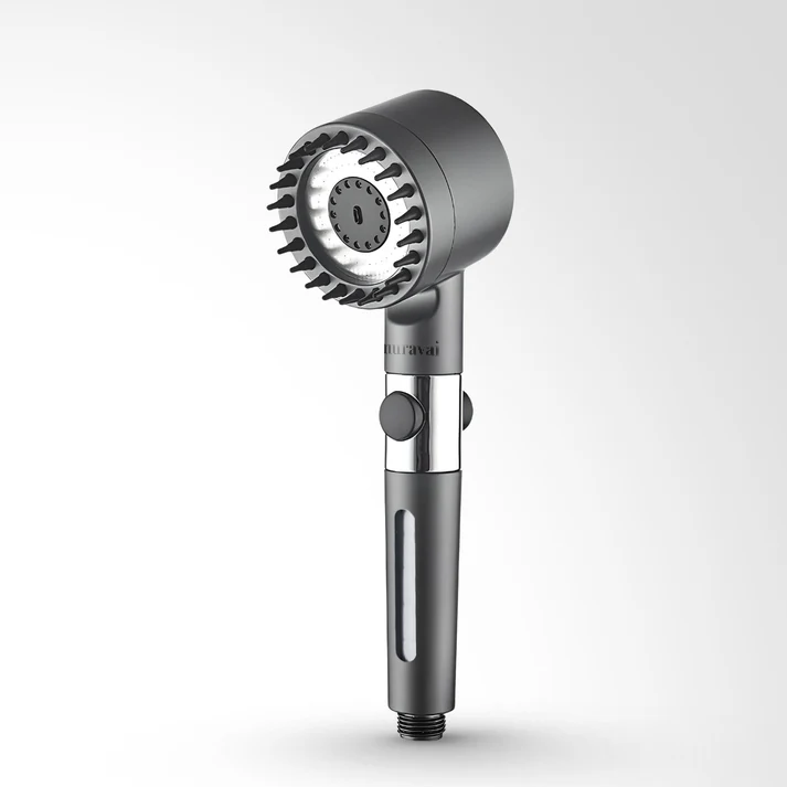 Aurenza Shop THE FILTERED SHOWERHEAD with sleek chrome finish, showing water flow and adjustable spray settings.