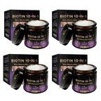 Two jars of Aurenza Shop Biotin 10-in-1 Skin Restoration Cream, made and shipped from the USA, shown with fresh green leaves.