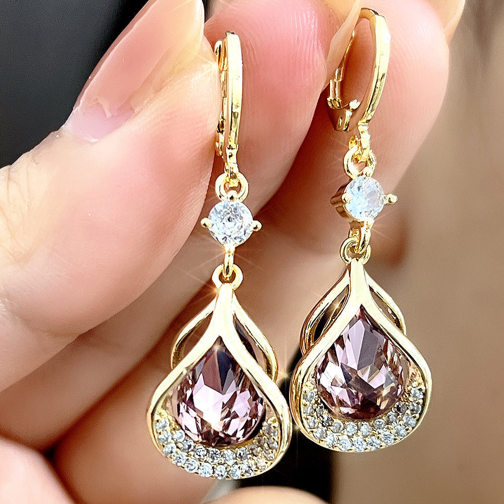 Set of three WIMAID™ Lymph Flow Magnetogen Earrings by Aurenza Shop in white, blue, and purple with magnetic healing elements.