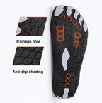 Aurenza Shop black barefoot shoes with aqua wave design, unisex fit, suitable for healthy feet, displayed on a model's feet.