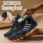 Aurenza Shop black barefoot shoes with aqua wave design for men and women, promoting healthy feet, shown on feet size 23.5cm.