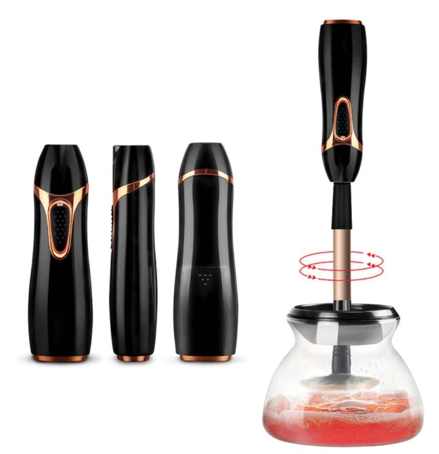 Aurenza Shop Makeup Brush Cleaner™ in black, shown with cleaning brushes ready for use.