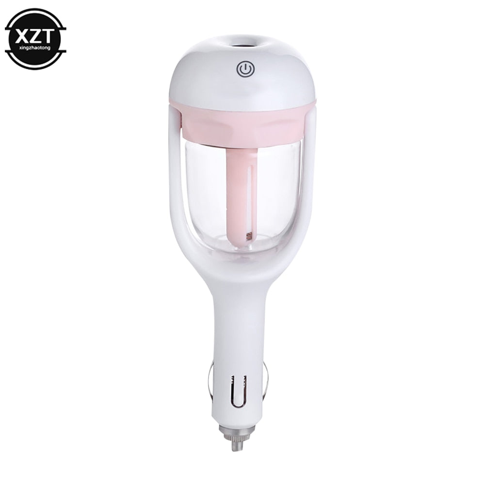 Black Aurenza Shop mini car humidifier shown on a car dashboard, compact and portable for refreshing air during drives.