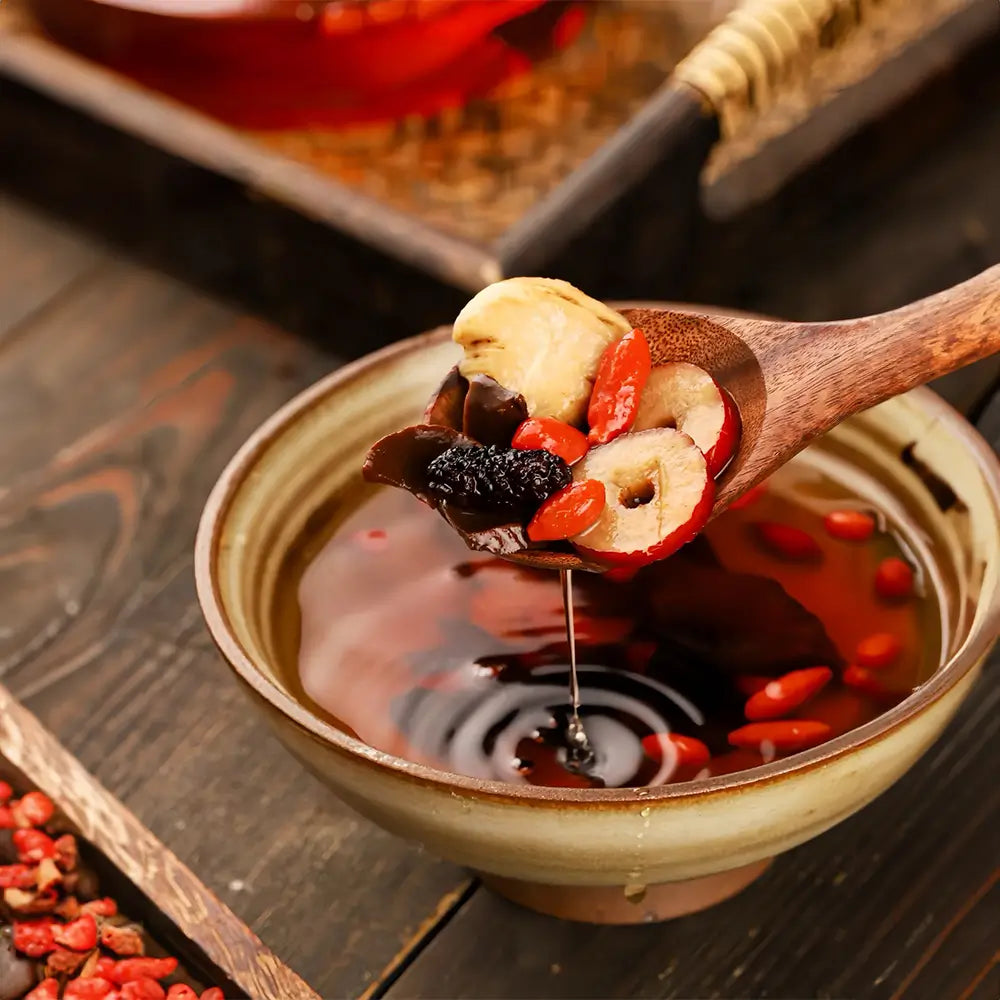 A set of 30 Ginseng and Mulberry Herbal Tea packets by Aurenza Shop, arranged in a box for a one-month treatment.