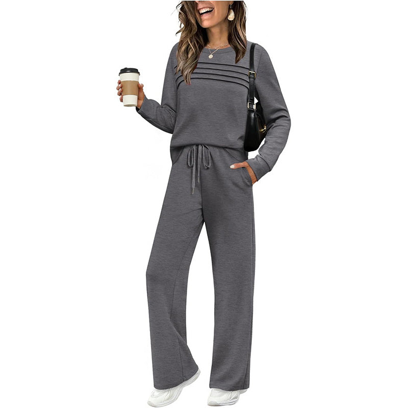 Beige women's crew neck top and drawstring pants set by Aurenza Shop, stylish casual clothing for women.