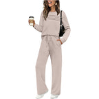 Beige women's crew neck top and drawstring pants set by Aurenza Shop, casual clothing ensemble for everyday wear.