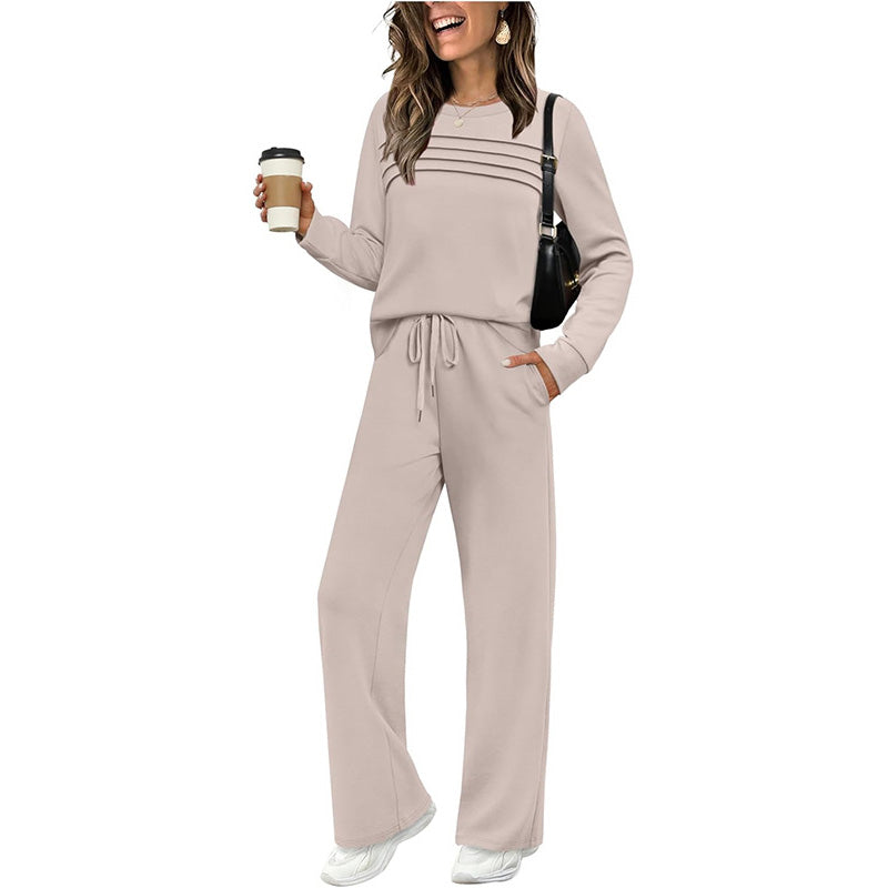 Beige women's crew neck top and drawstring pants set by Aurenza Shop, casual clothing ensemble for everyday wear.