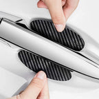 Aurenza Shop 4-pack carbon fiber door handle protectors with anti-scratch film for car door handle accessories.