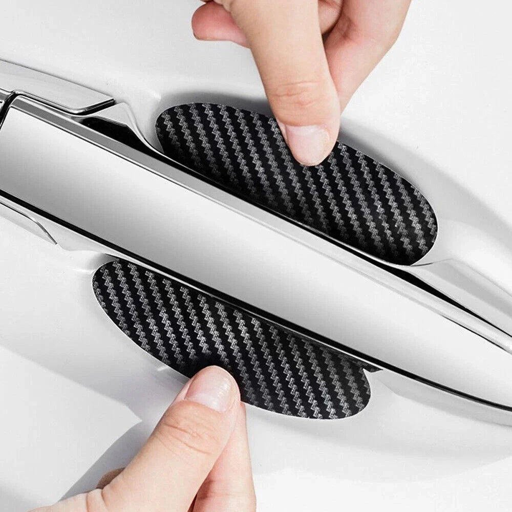 Aurenza Shop 4-pack carbon fiber door handle protectors with anti-scratch film for car door handle accessories.