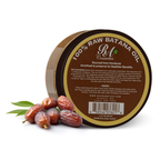 Bottle of Aurenza Shop Batana Hair Oil with a natural wooden cap, displayed on a neutral background.