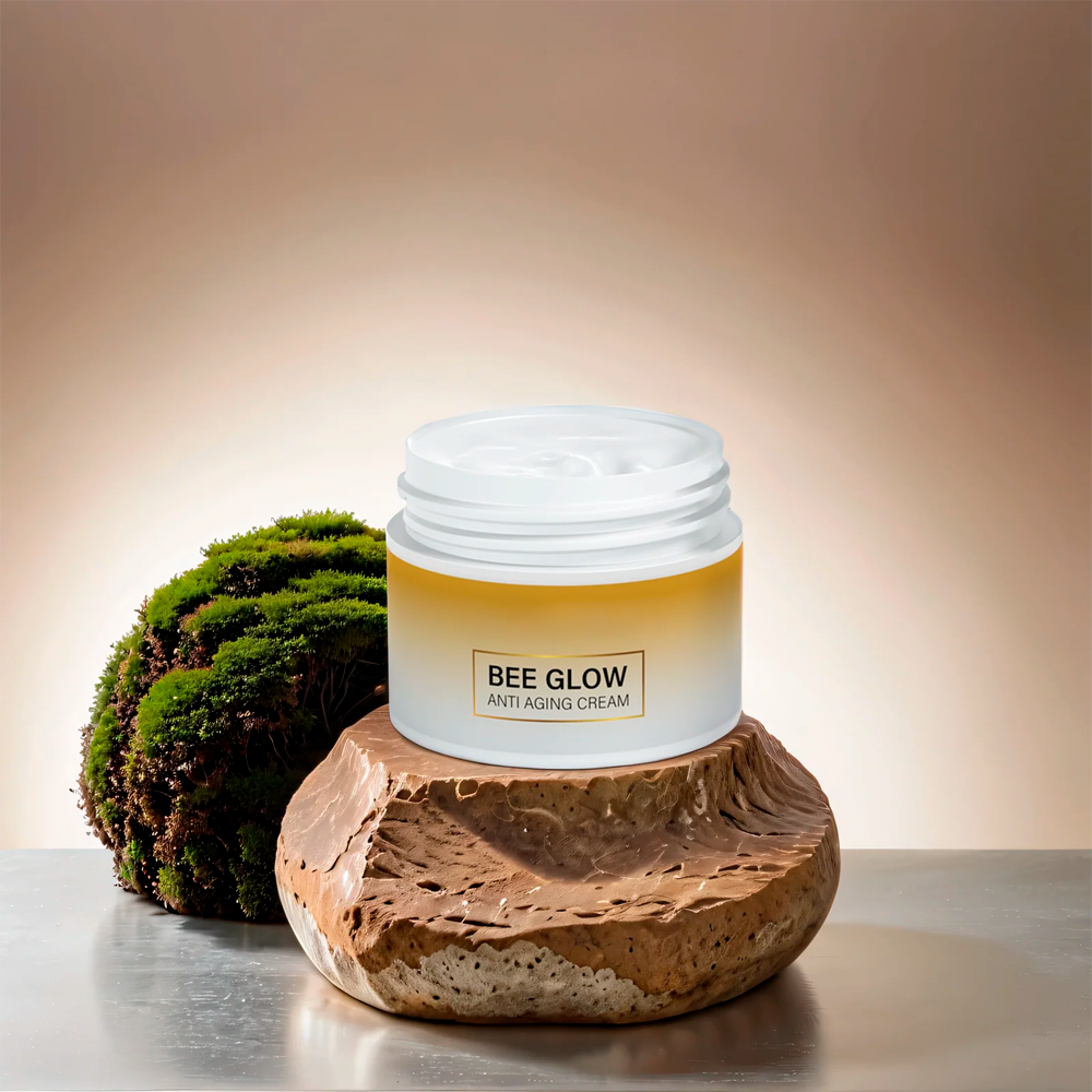 Aurenza Shop Bee Glow Anti-Aging Cream jar with golden lid and label, showcasing the skincare product for youthful skin.