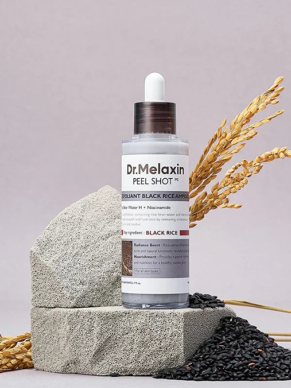Dr.Melaxin Peel Shot Glow Rice Ampoule Duo in black and white bottles, featuring a skincare set with brightening and exfoliating properties.
