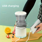 Aurenza Shop JuiceJoy portable juicer in white with a clear juice container and compact design, perfect for on-the-go fruit juice.
