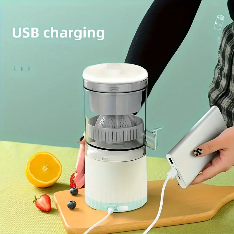 Aurenza Shop JuiceJoy portable juicer in white with a clear juice container and compact design, perfect for on-the-go fruit juice.