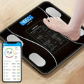Aurenza Shop smart digital scale with LED display showing weight up to 400 lbs on a clean bathroom floor.