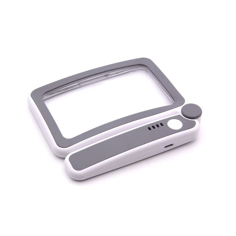Gray folding handheld magnifying glass with built-in light, ideal for reading and detailed kitchen tasks, by Aurenza Shop.