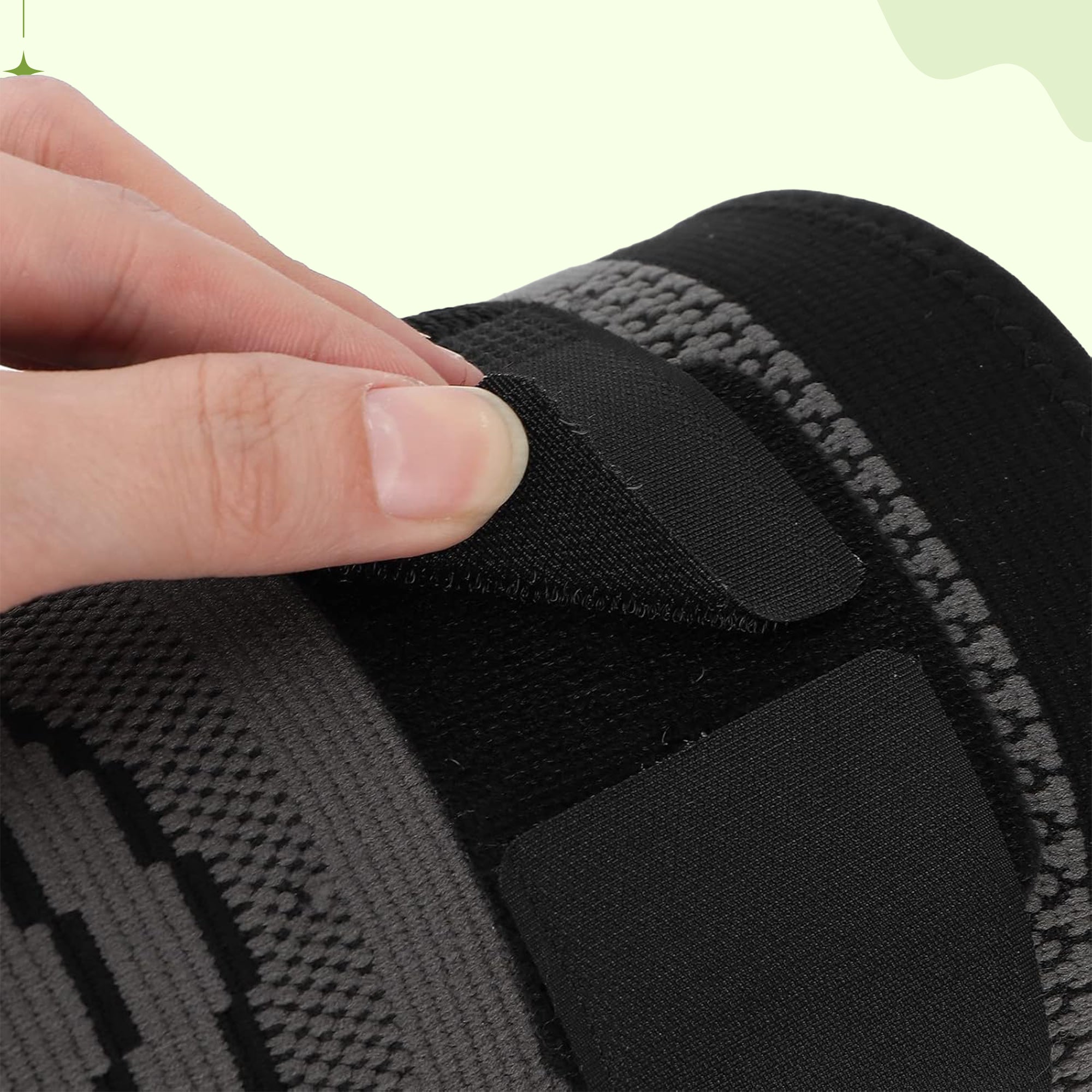 Black and green Aurenza Shop compression knee support brace for men and women, ideal for running, walking, hiking, and sports.