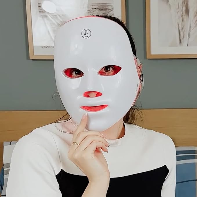 Aurenza Shop Kahuna Red Therapy Facial Mask massager with red mask and ergonomic design for facial skin therapy.