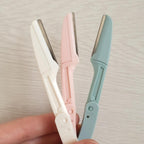 Pack of 3 Aurenza Shop eyebrow and face razors with precision blades for grooming and hair removal.