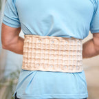 Aurerza Therava™ Press Belt in black, made of durable material, designed for waist support and compression.