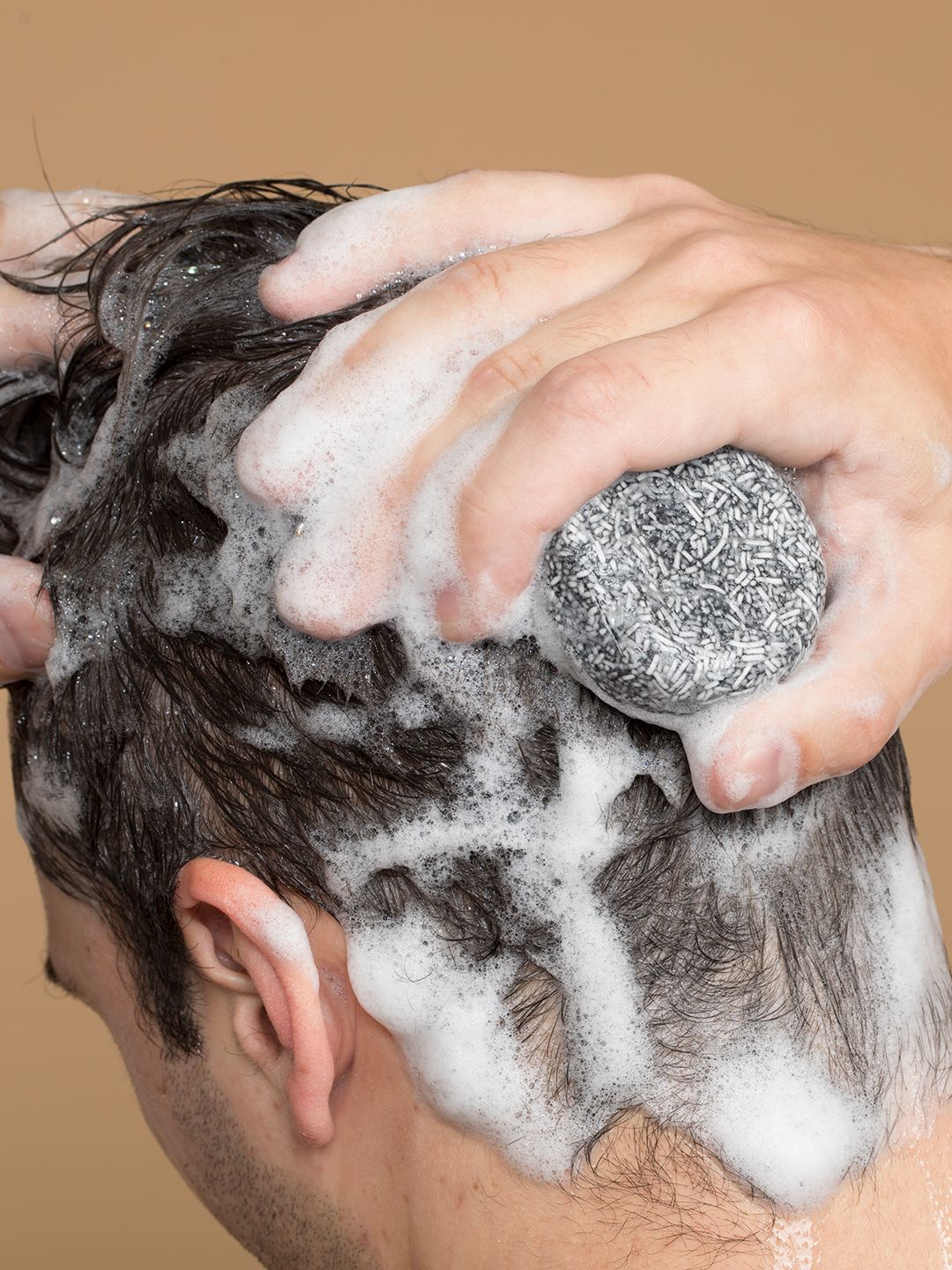 Gray Reverse Bar shampoo bar by Aurenza Shop, showcasing its sleek gray design and compact, eco-friendly packaging.
